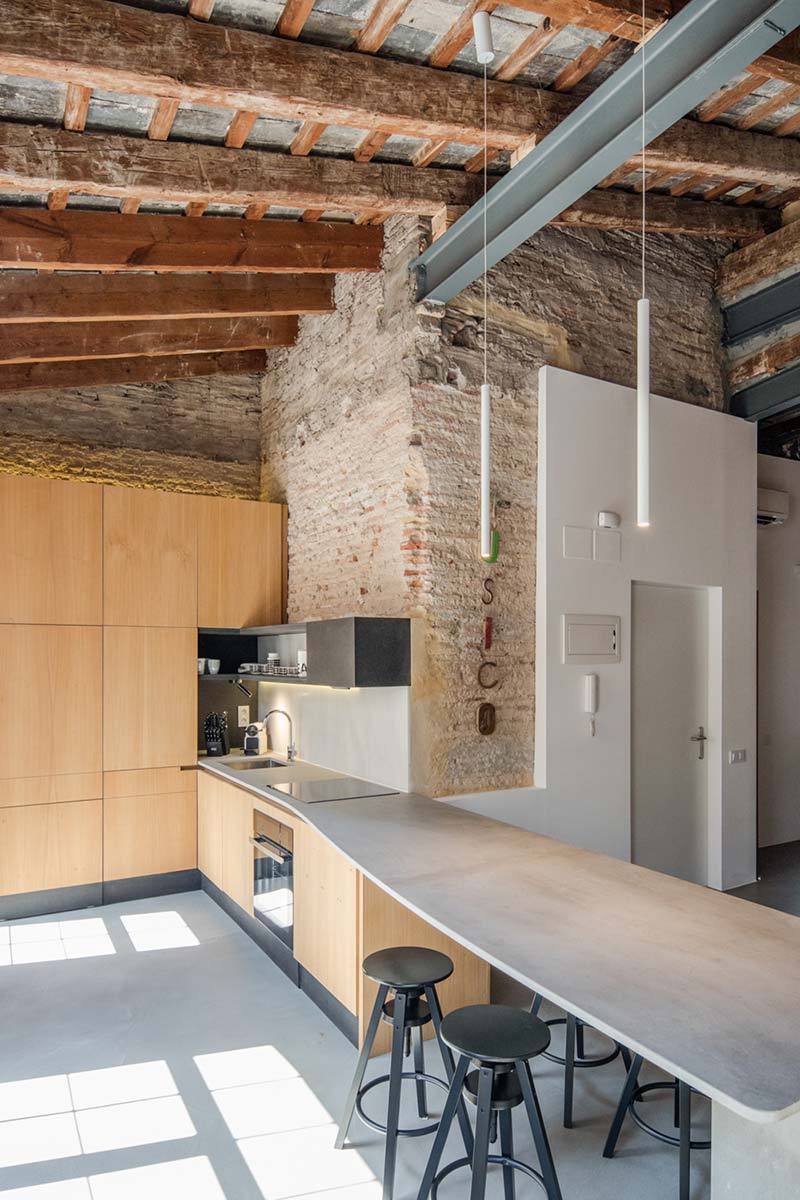 Wood & Stone Apartment Renovation in the Heart of Valencia, Spain